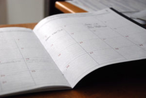 Five Reasons Why You Need a to Develop a Will - paper planning calendar on desk